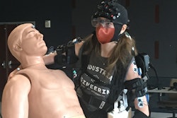 Doctoral student Sarah Hopko is wearing an exoskeleton while performing patient handling tasks. Her brain activity is being tracked using Near Infrared Spectroscopy, gaze behavior is being tracked using eye tracking and muscle activity through electromyographic sensors.