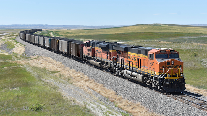 A BNSF railroad train hauling carloads of coal from the Powder River Basin of Montana and Wyoming is seen east of Hardin, Mont., on July 15, 2020. BNSF Railway has gone to court to determine whether it has the authority to require all its employees to get vaccinated against the coronavirus.
