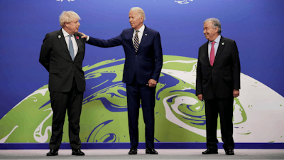 British Prime Minister Boris Johnson, left, and UN Secretary-General Antonio Guterres, right, greet U.S. President Joe Biden , at the COP26 U.N. Climate Summit in Glasgow, Scotland, Monday, Nov. 1, 2021. The U.N. climate summit in Glasgow gathers leaders from around the world, in Scotland's biggest city, to lay out their vision for addressing the common challenge of global warming.