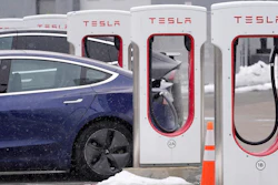 A Tesla vehicle at a charging station at a dealership in Dedham, Mass., Feb. 18, 2021.
