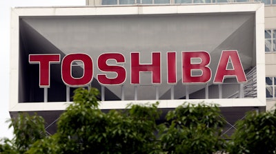 This photo shows the company logo of Toshiba Corp. displayed in front of its headquarters in Tokyo on May 26, 2017.