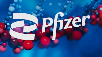 The Pfizer logo is displayed at the company's headquarters in New York, on Feb. 5, 2021. In a statement on Tuesday, Nov. 16, 2021, drugmaker Pfizer Inc. said it has signed a deal with a U.N.-backed group to allow other manufacturers to make its experimental coronavirus pill, in a move that could make its treatment available to more than half of the world’s population.