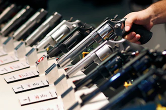 Handguns displayed at the Smith & Wesson booth at the Shooting, Hunting and Outdoor Trade Show in Las Vegas, Jan. 19, 2016.