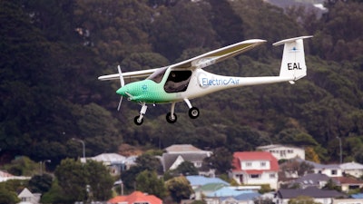 The ElectricAir plane is on approach before landing at Wellington Airport in Wellington, New Zealand, Monday, Nov. 1, 2021. Seeking to highlight the potential for green aviation as a pivotal climate change conference opened in Glasgow, New Zealand pilot Gary Freedman made the first-ever flight over Cook Strait in an electric plane.