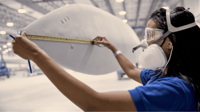 The construction of a wind turbine blade at LM Wind Power.