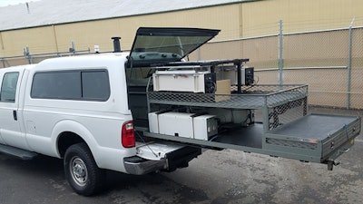 SIGMA+ sensors detecting the entire spectrum of weapons of mass destruction (WMD) threats slide into the back of a police vehicle with additional space on the racks for regular police cargo.