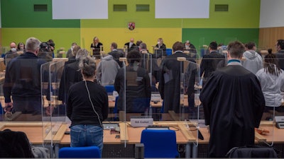 Presiding judge G'nther Koehler announces the verdicts in the so-called Cyberbunker trial at the regional court in Trier, Germany, Dec. 13, 2021.