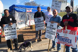 Striking Kellogg's workers Michael Rodarte, Sue Griffin, Michael Elliott, Eric Bates and Mark Gonzalez stand outside the Omaha, NE cereal plant on Dec. 2, 2021.