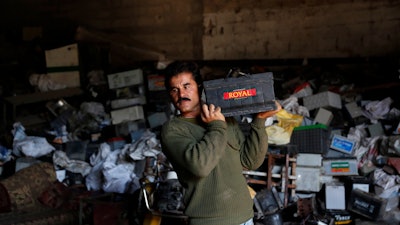 In a territory suffering from chronic power outages, batteries are needed to keep most Gaza households running. But huge mounds of used batteries are piling up at makeshift outdoor landfills, posing a threat to public health and the environment.