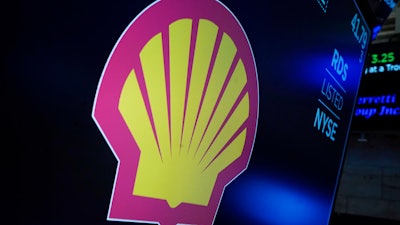 Royal Dutch Shell investors are expected to change the company’s name and share structure on Friday, Dec. 10, 2021, as the oil giant struggles to prove its green credentials amid criticism from all sides that it has been slow to cut greenhouse gas emissions.