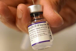 Pfizer said Wednesday, Dec. 8, 2021, that a booster dose of its COVID-19 vaccine may protect against the new omicron variant even though the initial two doses appear significantly less effective.