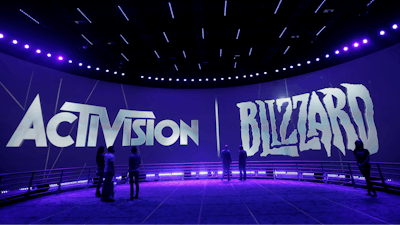 The Activision Blizzard Booth is shown on June 13, 2013 the during the Electronic Entertainment Expo in Los Angeles. Microsoft is buying Activision Blizzard, Tuesday, Jan. 18, 2022, for $68.7 billion to gain access to blockbuster games including Call of Duty and Candy Crush. The all-cash deal will let Microsoft accelerate mobile gaming and provide it building blocks for the metaverse, or a virtual environment.