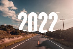 The Word 2022 Behind The Tree Of Empty Asphalt Road At Golden Sunset And Beautiful Blue Sky 1300086148 2125x1417 (1)