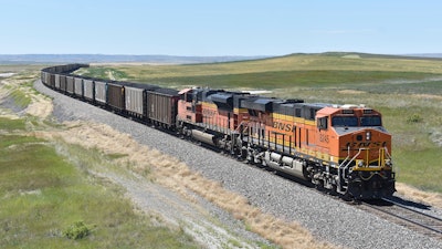 BNSF railroad wants a federal judge to prevent two of its unions from going on strike next month over a new attendance policy that would penalize employees for missing work.