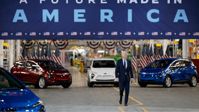 President Joe Biden arrives to speak during a visit to the General Motors Factory ZERO electric vehicle assembly plant, Wednesday, Nov. 17, 2021, in Detroit. Some Tesla fans and Elon Musk have picked an online fight with Biden over the company being left out as Biden touts EVs as a solution to climate change. “For reasons unknown,' Musk tweeted Sunday, Jan. 30, 2022, referring to the president, “@potus is unable to say the word ‘Tesla.'”