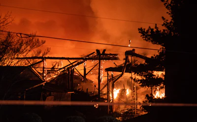 A structure fire burns at the Weaver Fertilizer Plant on Monday, Jan. 31, 2022, in Winston-Salem, N.C.