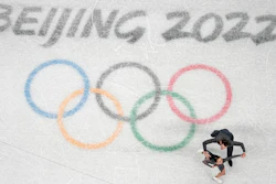 Karina Safina and Luka Berulava of Gerogia compete during the pairs short program figure skating competition at the 2022 Winter Olympics, Beijing, Feb. 4, 2022.