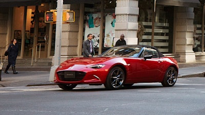 This photo provided by Mazda shows the 2022 Mazda MX-5 Miata, a small rear-wheel-drive roadster that's a rarity among cars today.