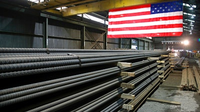 In this May 9, 2019 photo, steel rods produced at the Gerdau Ameristeel mill in St. Paul, MN, await shipment.