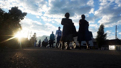 Women make their way to work in the garment district in Maseru, Lesotho, Friday, Feb. 25, 2022 When the coronavirus pandemic hit the world two years ago, the global fashion industry crumpled when faced with collapsing demand, brands canceled orders worth billions of dollars and few felt the effects so harshly as the tens of millions of workers, most of them women, who stitched the world's clothes.