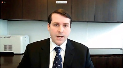 In this image taken from video from House Television, David Sackler, a member of the family that owns Purdue Pharma, testifies via video to a House Oversight Committee hearing on Dec. 17, 2020. Yale University has begun removing the Sackler name from its campus, several years after announcing it would no longer accept donations from the family that owns OxyContin maker Purdue Pharma.