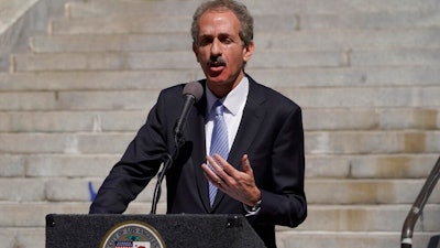 Los Angeles City Attorney Mike Feuer announces a lawsuit seeking environmental justice from Monsanto and two related companies for pollution of the City's waterways with polychlorinated biphenyls (PCBs) at a news conference outside Los Angeles City Hall, March 7, 2022. The lawsuit seeks to force Monsanto to abate PCB pollution and reimburse the City for costs it has already incurred.