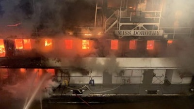 ​​​​Starboard side of the Miss Dorothy during firefighting efforts from the Good Samaritan towing vessel Christopher Wilson.