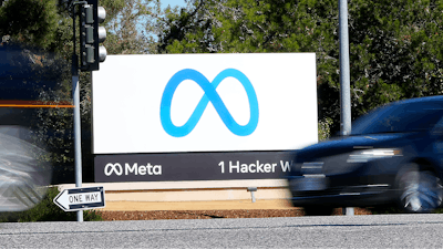 In this Oct. 28, 2021, photo, Facebook unveiled their new Meta logo on a sign at the company headquarters in Menlo Park, Calif.