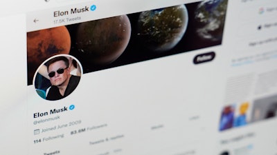 The Twitter page of Elon Musk is seen on the screen of a computer in Sausalito, Calif., on Monday, April 25, 2022. On Monday, Musk reached an agreement to buy Twitter for about $44 billion.