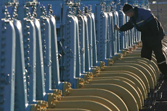 A Belarusian worker on duty at a gas compressor station of the Yamal-Europe pipeline near Nesvizh, some 130 km (81 miles) southwest of the capital Minsk, Belarus, Dec. 29, 2006. Officials in Poland and Bulgaria say Russia is suspending their countries’ natural gas deliveries starting on Wednesday. The governments of the two European countries said Tuesday April 26, 2022, that Russian energy giant Gazprom informed them it was halting gas supplies.