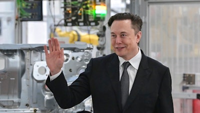 Tesla CEO Elon Musk attends the opening of the Tesla factory Berlin Brandenburg in Gruenheide, Germany, Tuesday, March 22, 2022. Elon Musk is taking a 9.2% stake in Twitter. Musk purchased approximately 73.5 million shares, according to a regulatory filing.
