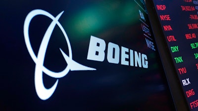 Boeing said Wednesday, April 27, 2022, that it lost $1.24 billion in the first quarter and took large write-downs for several programs.