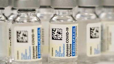 Vials of the Johnson & Johnson COVID-19 vaccine are seen at a pharmacy in Denver on Saturday, March 6, 2021. On Thursday, May 5, 2022, U.S. regulators strictly limited who can receive this vaccine due to a rare but serious risk of blood clots.