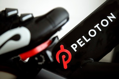 This Nov. 19, 2019 file photo shows the logo on a Peloton bike in San Francisco. Peloton's loss widened in its fiscal third quarter and sales continued to slow as the company contends with a further cooling of the exercise-at-home trend. Shares tumbled more than 25% before the market open on Tuesday, May 10, 2022.