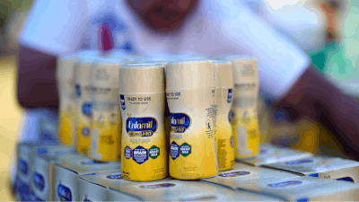 Infant formula is stacked on a table during a baby formula drive to help with the shortage Saturday, May 14, 2022, in Houston. Parents seeking baby formula are running into bare supermarket and pharmacy shelves in part because of ongoing supply disruptions and a recent safety recall.