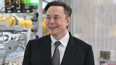 Tesla CEO Elon Musk attends the opening of the Tesla factory Berlin Brandenburg in Gruenheide, Germany on March 22, 2022. Musk says his deal to buy Twitter can’t ‘move forward’ unless the company shows public proof that less than 5% of the accounts on the platform are fake or spam. Musk made the comment in a reply to another user on Twitter early Tuesday, May 17, 2022.
