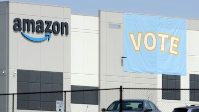 A banner encouraging workers to vote in labor balloting at an Amazon warehouse in Bessemer, Ala., March 30, 2021.