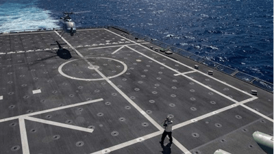 A MQ-8C Fire Scout prepares to land aboard USS JACKSON (LCS-6) in the Pacific Region, April 19, 2022.