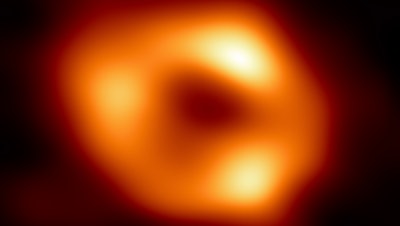 This image released by the Event Horizon Telescope Collaboration, Thursday, May 12, 2022, shows a black hole at the center of our Milky Way galaxy. The Milky Way black hole is called Sagittarius A*, near the border of Sagittarius and Scorpius constellations. It is 4 million times more massive than our sun. The image was made by eight synchronized radio telescopes around the world.