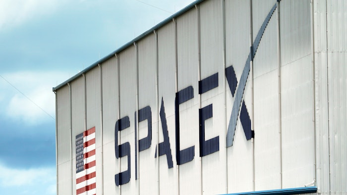 a SpaceX logo is displayed on a building on May 26, 2020, at the Kennedy Space Center in Cape Canaveral, Fla. SpaceX, the rocket ship company run by Tesla CEO Elon Musk, has fired several employees involved in an open letter that blasted the colorful billionaire for his behavior, according to media reports Friday, June 17, 2022.
