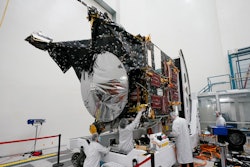 Technicians work on the Psyche spacecraft at the NASA Jet Propulsion Laboratory, April 11, 2022, in Pasadena, Calif. NASA put an asteroid mission on hold Friday, June 24, 2022, blaming the late delivery of its own navigation software. The Psyche mission to a strange metal asteroid of the same name was supposed to launch this September or October. But the agency’s Jet Propulsion Lab was several months late writing and delivering its software for navigation, guidance and control.