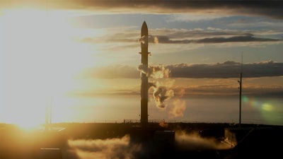 In this photo released by Rocket Lab, Rocket Lab's Electron rocket sits on the launch pad on the Mahia peninsula in New Zealand on May 17, 2022. NASA plans to send up a satellite to track a new orbit around the moon which it hopes to use in the coming years to once again land astronauts on the lunar surface.