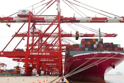In this photo released by Xinhua News Agency, a container ship from Japan is anchored at the container dock of Shanghai's Yangshan Port in east China on April 27, 2022. China’s trade growth rebounded in May after anti-virus restrictions that shut down Shanghai and other industrial centers began to ease, according to a customs agency statement on Thursday, June 9, 2022.