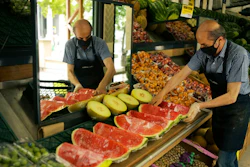 A worker arranges fruit for sale a food market in Ankara, Turkey, Friday, June 3, 2022. Annual inflation in Turkey hit 73.5% in May, according to official data released by the Turkish Statistical Institute on Friday, as a cost-of-living crisis in the country deepens.