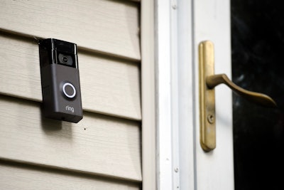 A Ring doorbell camera is seen installed outside a home in Wolcott, Conn., on July 16, 2019.