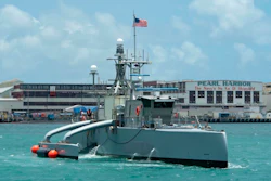 In this image provided by the U.S. Navy, a Sea Hunter, a crewless vessel, arrives at Pearl Harbor, Hawaii, to participate in the Rim of Pacific (RIMPAC) 2022, on June 29, 2022. The Navy is expediting development of drone ships aimed at expanding the reach of offensive firepower while keeping sailors on traditional warships farther from harm's way.