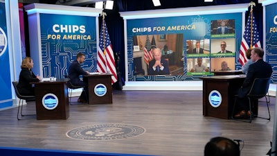 President Joe Biden speaks virtually during an event in the South Court Auditorium on the White House complex in Washington, Monday, July 25, 2022. Biden, who continues to recover from his coronavirus infection, spoke virtually with business executives and labor leaders to discuss the Chips Act, a proposal to bolster domestic manufacturing.