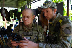 Ukrainian servicemen correcting artillery fire by drone at the frontline near Kharkiv, Ukraine, on Saturday, July 2, 2022. Never in the history of warfare have drones been used as intensively as in Ukraine, where they often play an outsized role in who lives and dies. Russians and Ukrainians alike depend heavily on unmanned aerial vehicles to pinpoint enemy positions and guide their hellish artillery strikes.