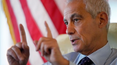 U.S. Ambassador to Japan Rahm Emanuel speaks during an interview with The Associated Press Tuesday, Aug. 2, 2022, at the ambassador's residence in Tokyo. Emanuel says his government is working with Japan and other likeminded countries to counter Chinese attempts to use its economic might to force political change around the world.