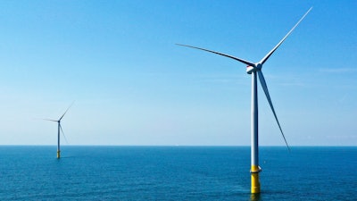 Two of the offshore wind turbines which have been constructed off the coast of Virginia Beach, Va. are viewed June 29, 2020. State regulators on Friday, Aug. 5, 2022, approved an application from Dominion Energy Virginia to build an enormous offshore wind farm off the coast of Virginia Beach and recover the cost from ratepayers.